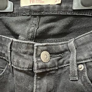 Levi’s 711 black skinny jeans